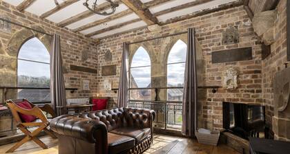 Exposed timbers, a feature stone fireplace, flagstone and oak floors – The Chapel has a wealth of pe