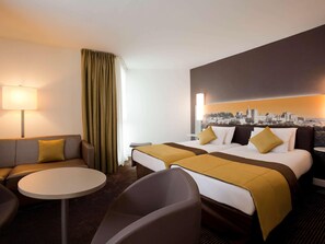 A hotel room with a bed, a sofa, a small table, and a chair. - Mercure Avignon Centre Palais des Papes Hotel (Avignon)