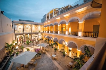 Courtyard at Palacio Provincial San Juan, Curio Collection by Hilton