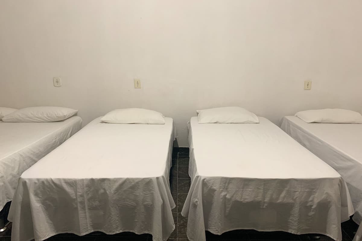 Family Room, Multiple Beds | Minibar, free WiFi, bed sheets