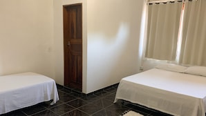 Triple Room, Multiple Beds | Minibar, free WiFi, bed sheets - Capital O Recanto Da Vila Hotel, Porto Seguro (Porto Seguro)