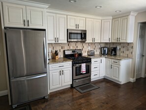 Fridge, microwave, oven, stovetop - Corner Lot Private House Near Disneyland | Private Hot Tub | Quiet Neighborhood (Anaheim)