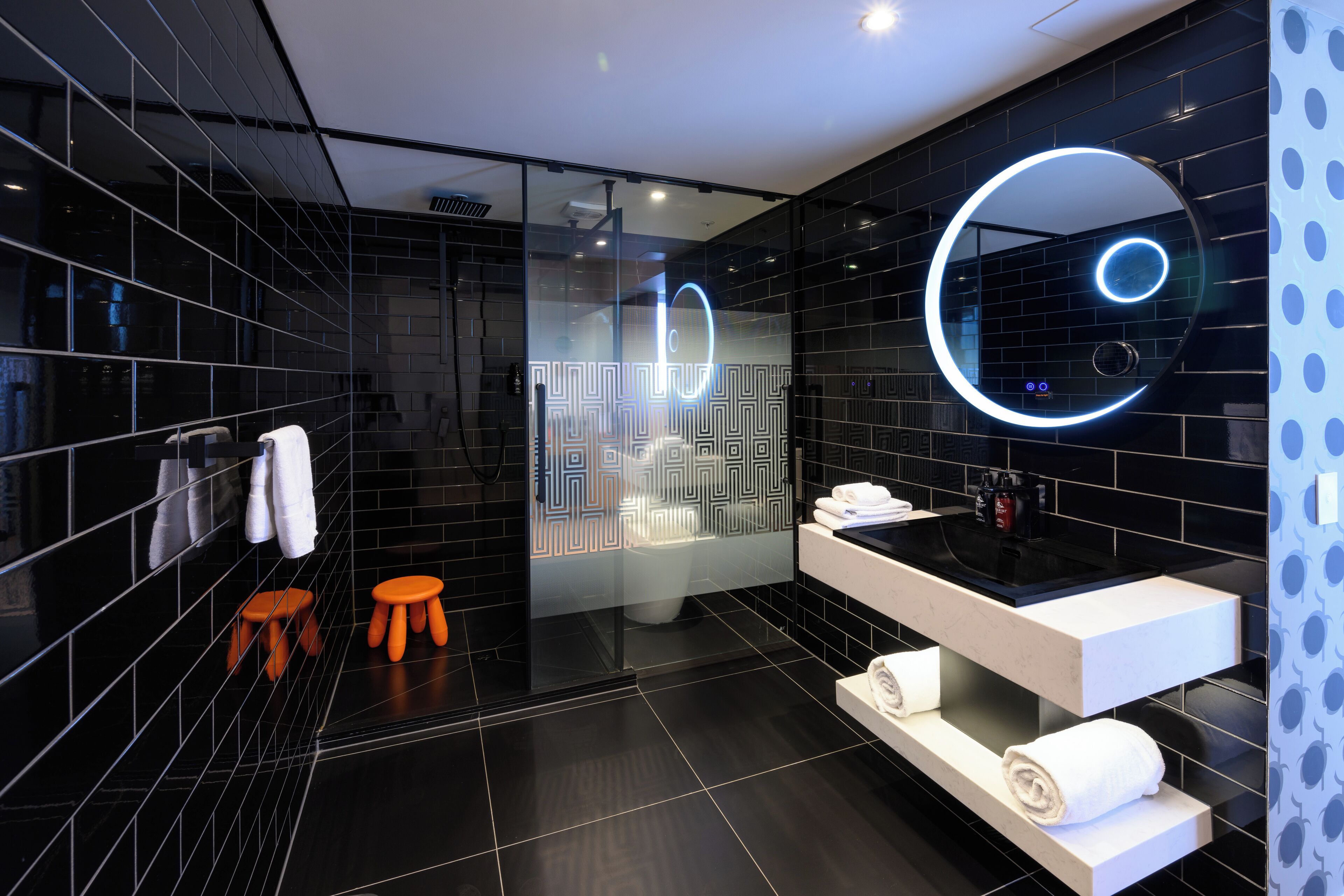premium suite | bathroom | eco-friendly toiletries, hair dryer, bathrobes, slippers