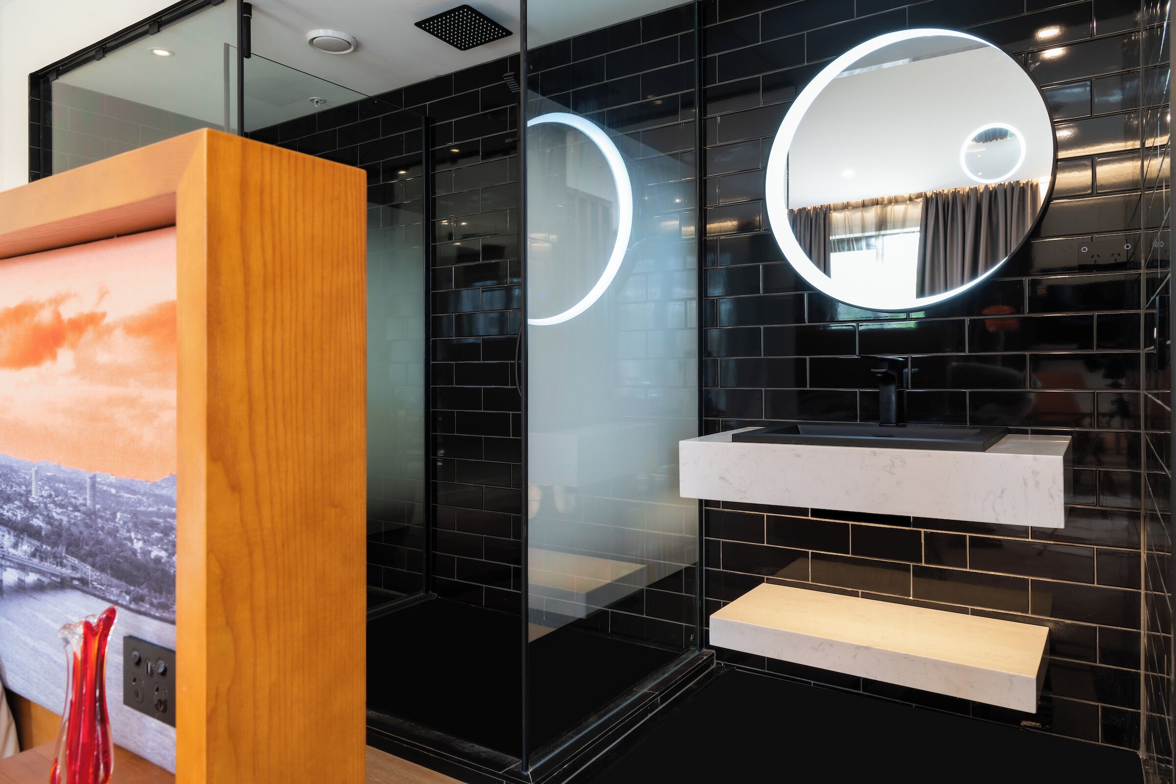 superior room with balcony | bathroom | eco-friendly toiletries, hair dryer, bathrobes, slippers