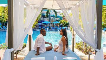 4 outdoor pools, open 7:00 AM to 8:00 PM, cabanas (surcharge)