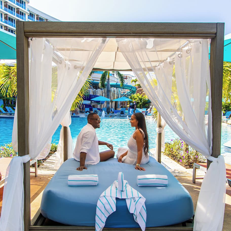 4 outdoor pools, open 7:00 AM to 8:00 PM, pool cabanas (surcharge)