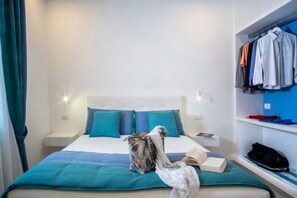 2 chambres, coffre-fort, fer et planche à repasser, lit de bébé portatif