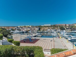 Enjoy waterfront views and access to a marina with a walkway and exercise equipment.