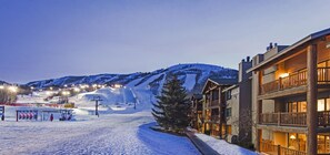 Experience the mountain views from the resort's spacious balconies, offering a convenient base for your ski adventure.