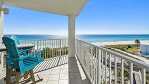 A balcony with a view of the beach and ocean. - SeaCrest 501AB - 3 BR Gulf Front  and Free Seasonal Beach Service (Fort Walton Beach)