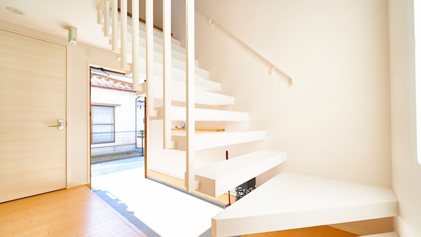 A modern staircase with a minimalist design, leading to a door with a glass panel. - Rakuten STAY HOUSE WILL STYLE Saga Imari (Imari)