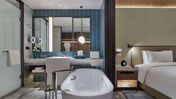 Separate bathtub and shower, rainfall showerhead, designer toiletries