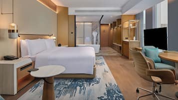 Habitación Deluxe, 1 cama de matrimonio grande | Ropa de cama hipoalergénica, edredones de plumas, minibar y caja fuerte