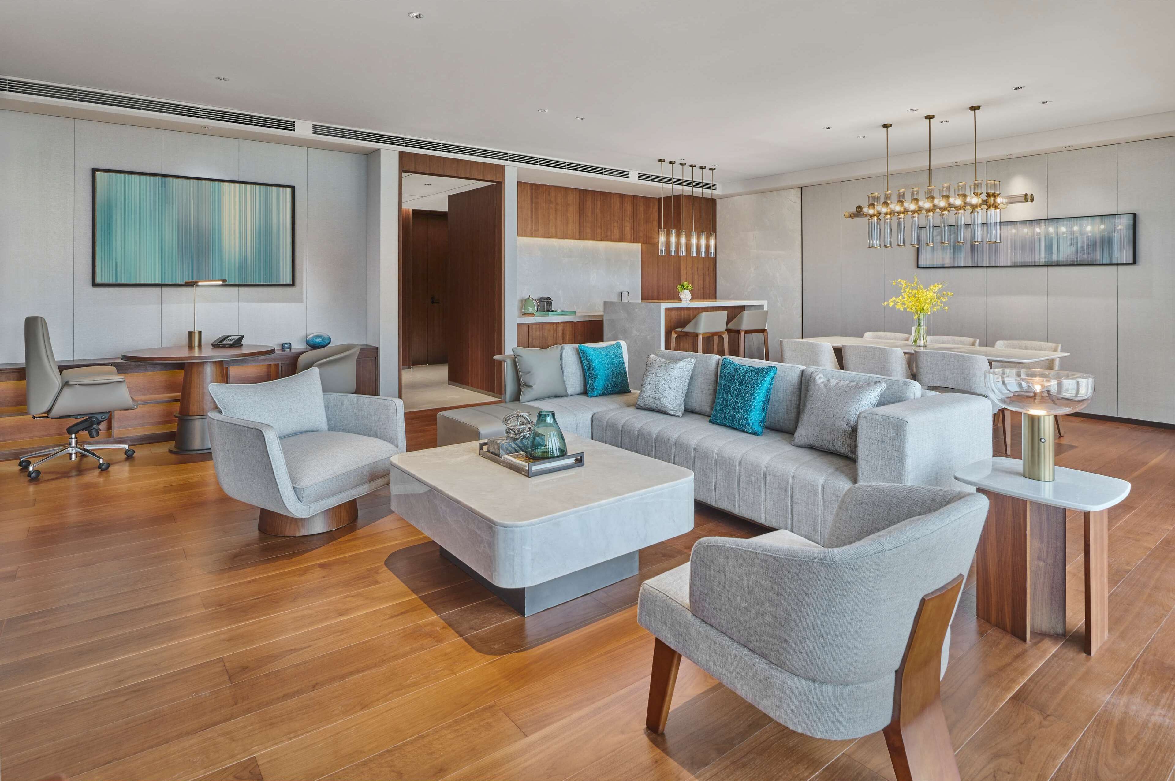 Suite, 1 King Bed (Ambassador) | Living area | 55-inch LED TV with cable channels, TV, pay movies