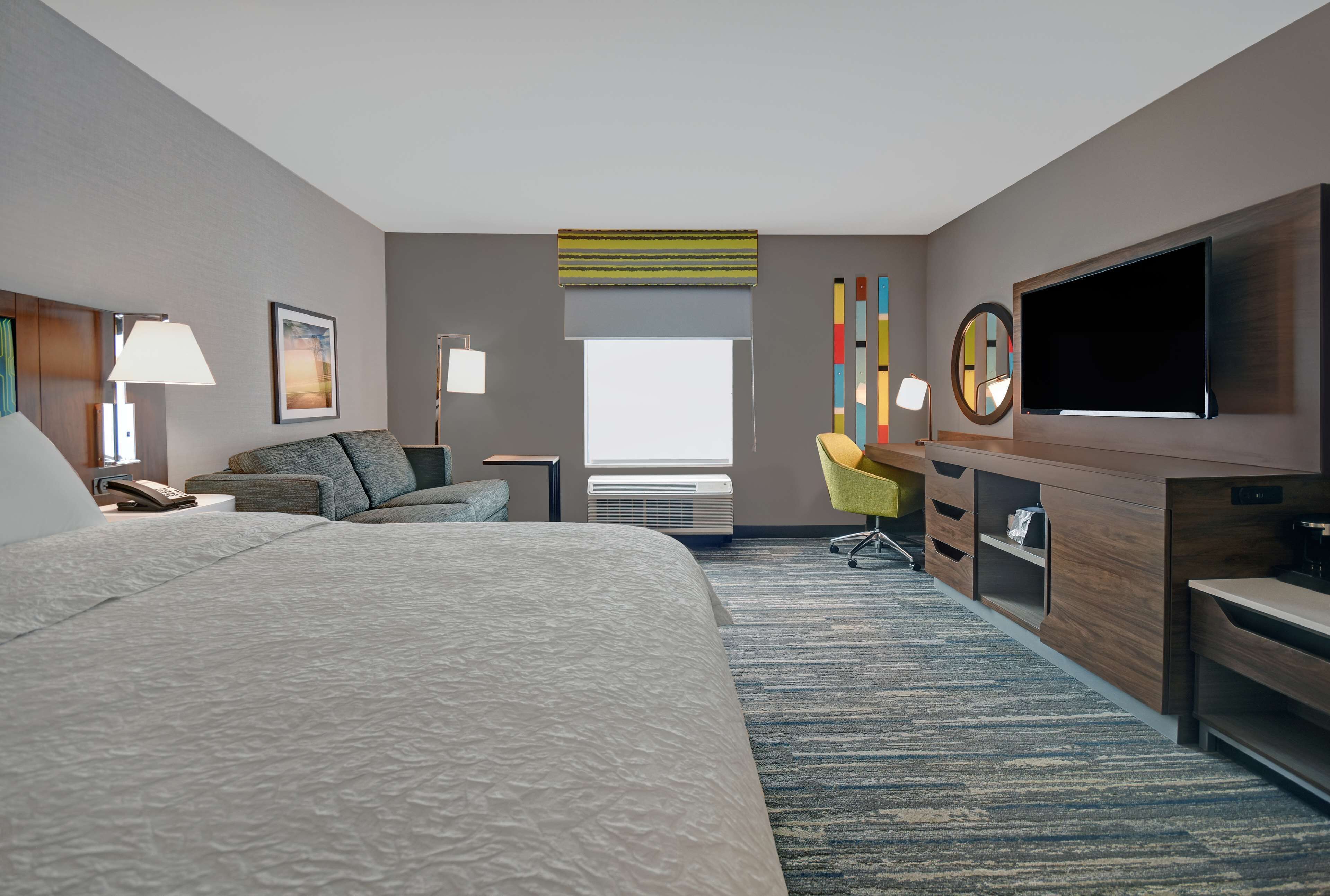 room, 1 king bed with sofa bed, refrigerator | desk, bed sheets