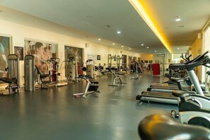 A gym with various exercise equipment, including treadmills and weight machines. - Pegasos World Side (Manavgat)