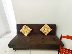 Apartamento conforto | Área de estar | TV LED