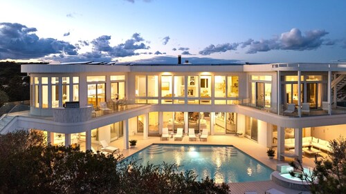 An awe-inspiring 8,000 SF custom oceanfront mansion retreat on two...