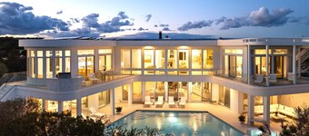 An awe-inspiring 8,000 SF custom oceanfront mansion retreat on two...