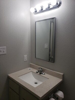 Combined shower/tub, hair dryer, towels, soap