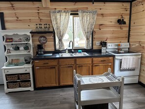 Microwave, oven, stovetop - Cozy 2-Bedroom Cabin Across from the Beautiful Lindquist Lake (Dunbar)