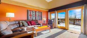 Inviting mountain condo w/private sauna, deck, mtn views, & shared hot tub/pool