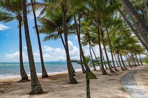 On the beach, sun-loungers, beach towels