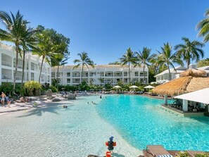 Outdoor pool, a heated pool - Ground Floor Poolside LUX Apt - Peppers Beach Club, w/Kitchen & Terrace Balcony (Palm Cove)