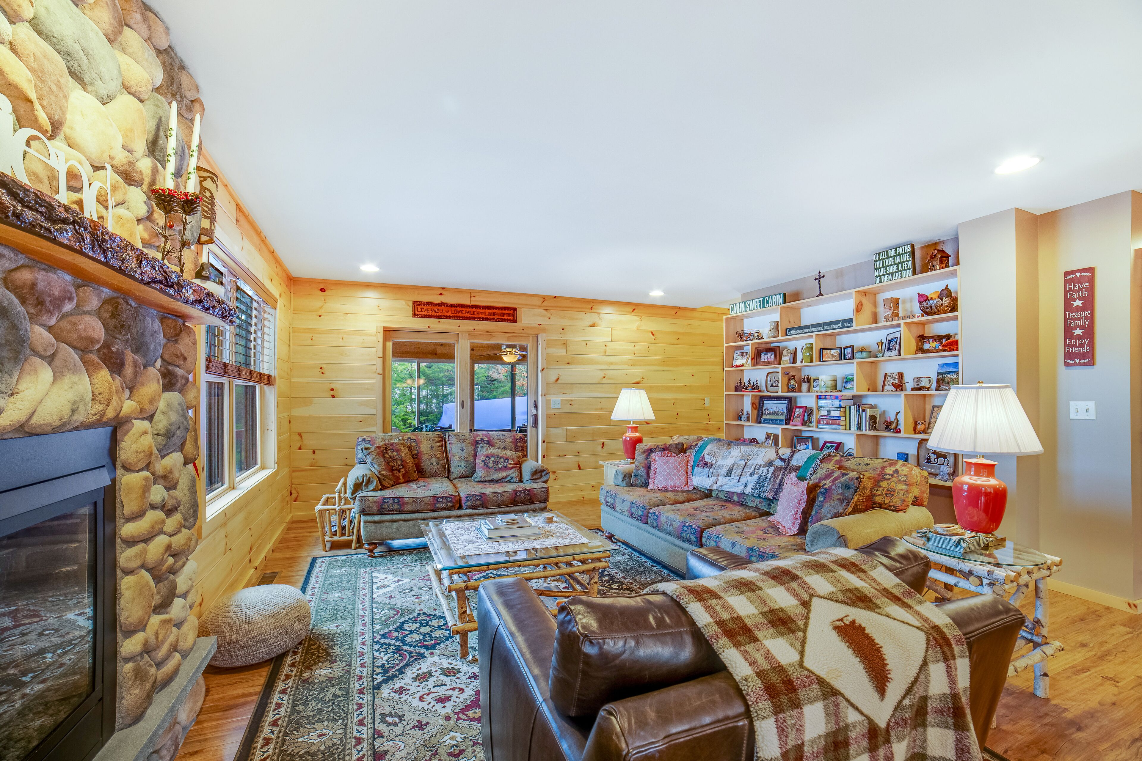 Gorgeous Lakefront Home with a Fire Pit, Two Living Areas, and a Sunroom