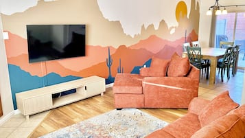 Smart TV, fireplace, books