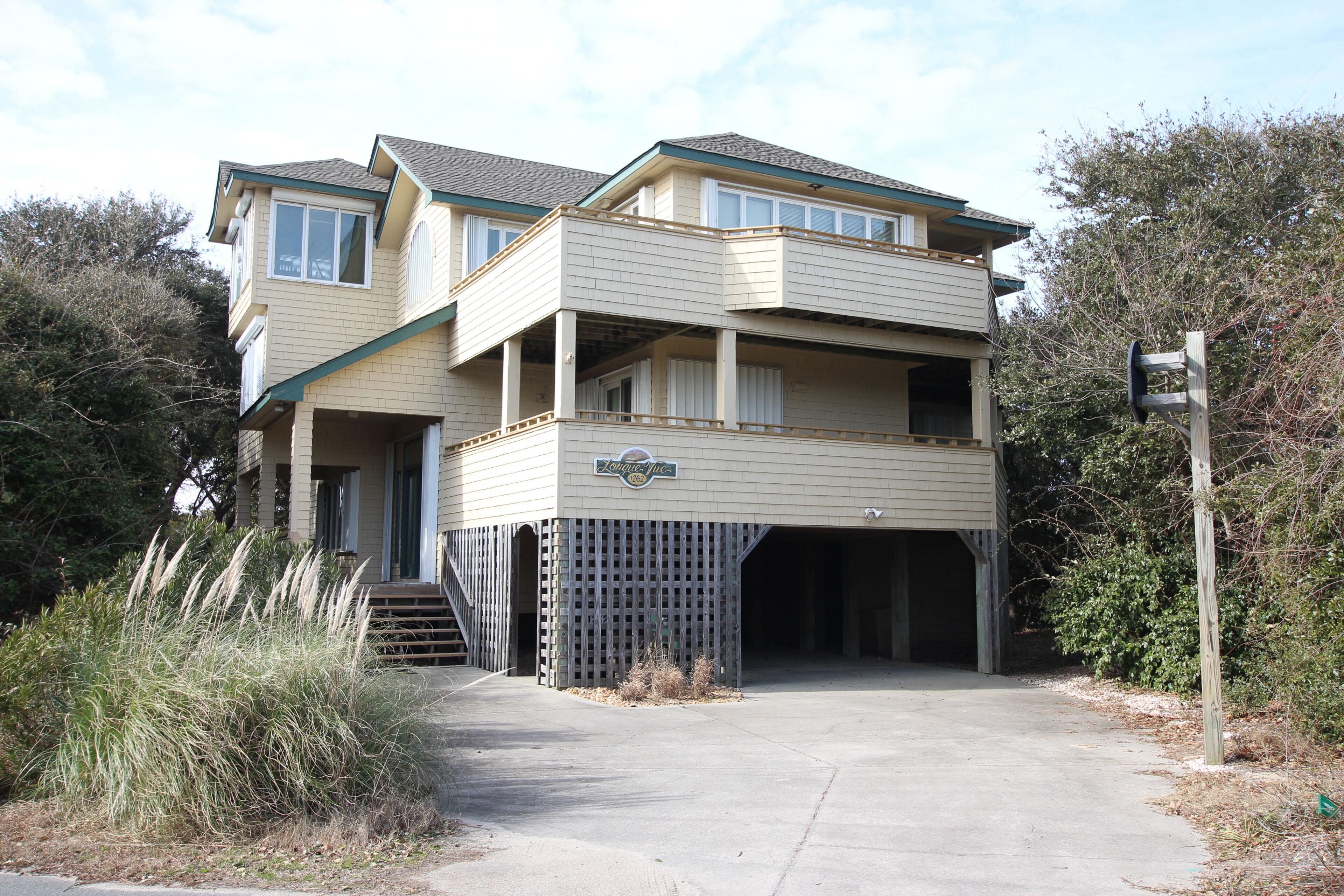 Partial ocean-view home In Corolla with hot tub & rec room