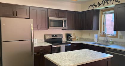 Roomy 2-story home with furnished deck, grill, fireplace, & great location