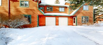 Roomy 2-story home with furnished deck, grill, fireplace, & great location