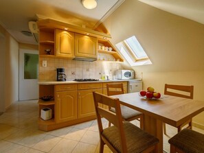 Fridge, microwave, cookware/dishes/utensils