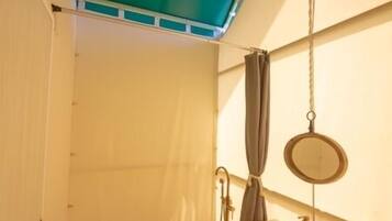 Shower, free toiletries, hair dryer, slippers