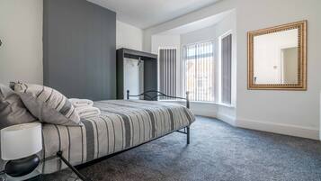 Business House, 2 Bedrooms, Non Smoking | 2 bedrooms, down comforters, Select Comfort beds, individually decorated