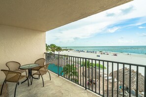 Outdoor dining - Sandy Shores 205 Gulf Front Corner Condo (Madeira Beach)