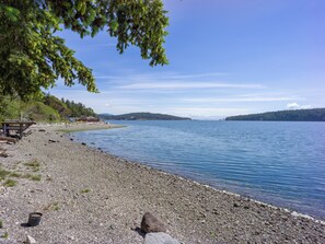 Escape to a serene lakeside haven with a tranquil atmosphere and lush surroundings.