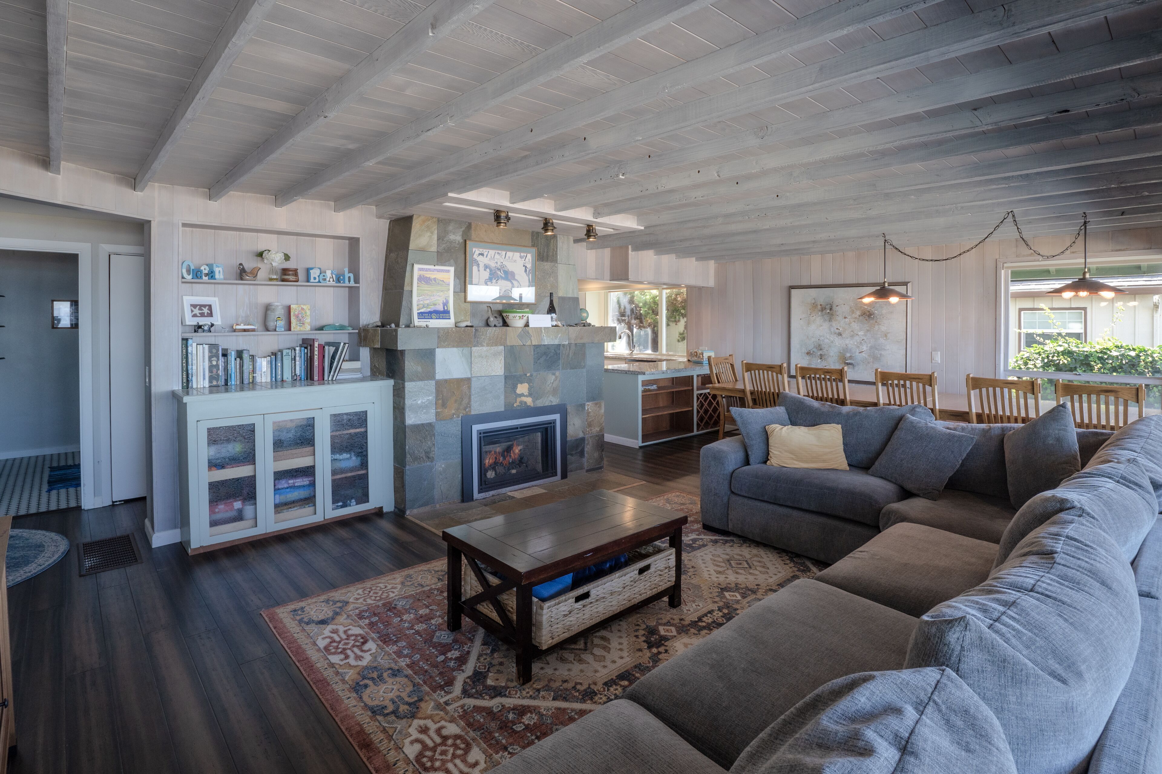 Enjoy the waves in the hot tub at this beachfront home with direct beach access