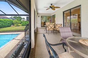 Outdoor dining - 3BR Marco Island home with heated pool, WiFi, and full kitchen. (Marco Island)