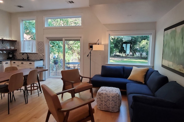 The open living/ kitchen feels light and airy, perfect for visiting.