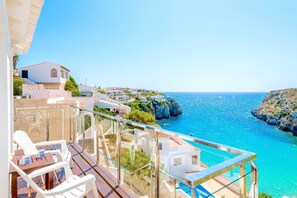 Property grounds - Seafront Villa Bellavista with private heated pool (Calan Porter)
