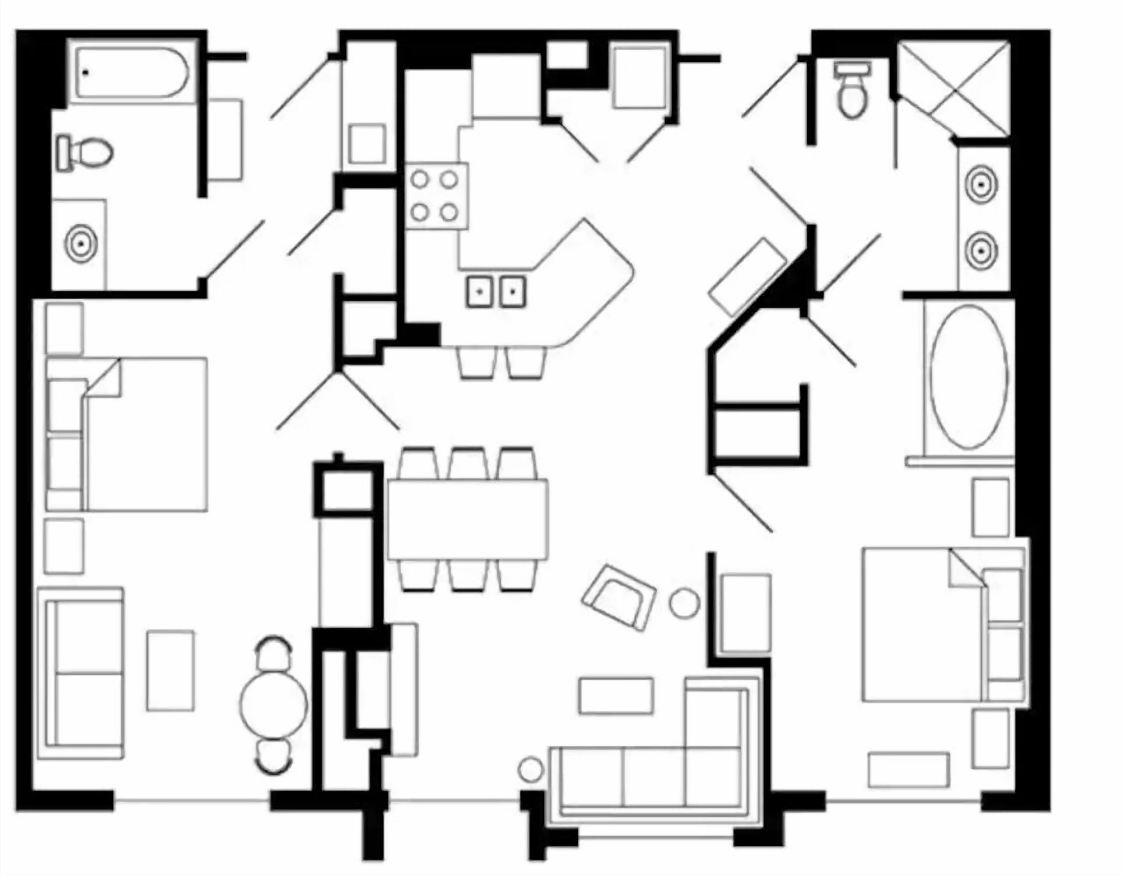 A floor plan of a hotel room with a kitchenette, a dining area, a bathroom, and a living area.