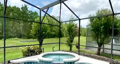 Isabellas Luxury 6BR Home Pool/Jacuzzi/Spa/GameRoom/BBQ Grill/ Mins from Disney