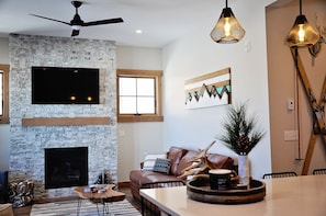 Smart TV, fireplace, DVD player, books