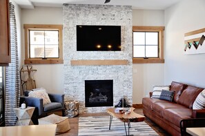 Smart TV, fireplace, DVD player, books