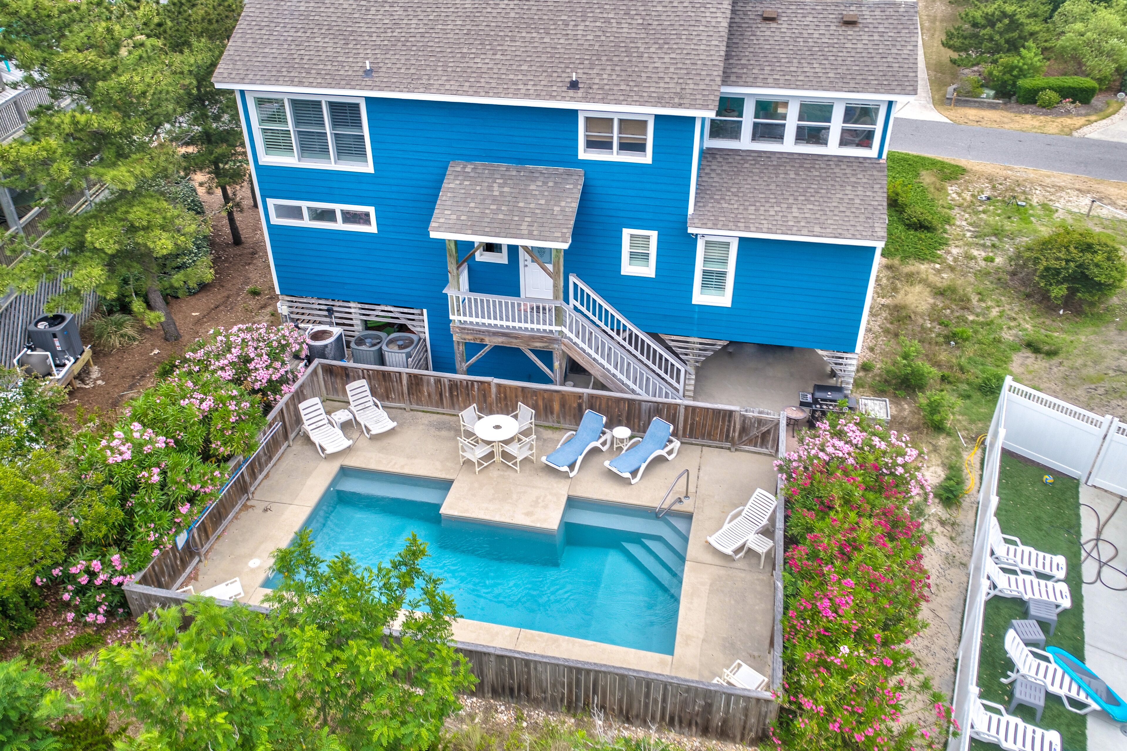 Partial ocean view home in Corolla with private heated pool & hot tub