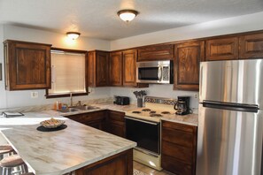 Oven, stovetop, dishwasher, coffee/tea maker