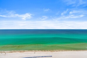 On the beach, sun-loungers