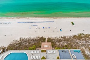 On the beach, sun-loungers